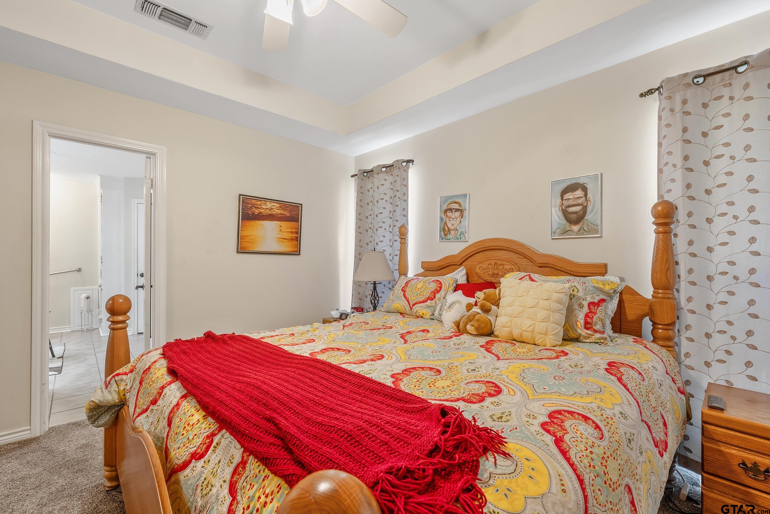 18054 Silver Leaf Flint, TX 75762 - Photo 14 of 30 a bedroom with a bed and a lamp