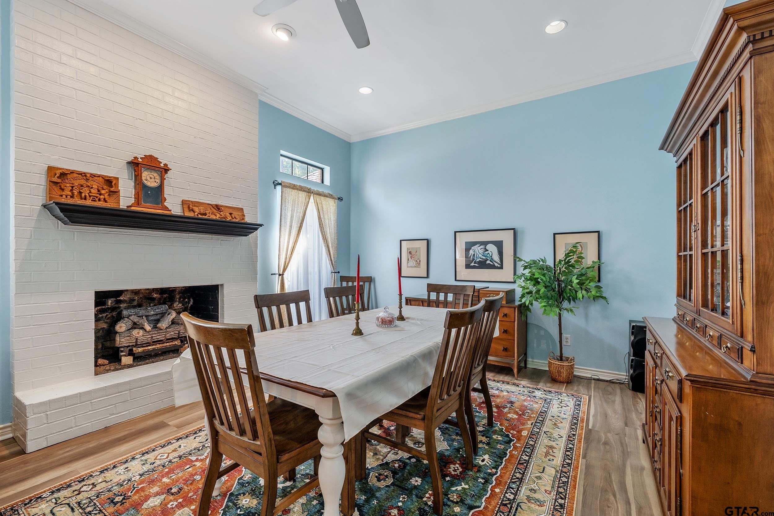 18054 Silver Leaf Flint, TX 75762 - Photo 2 of 30 a view of a dining room with furniture and a potted plant