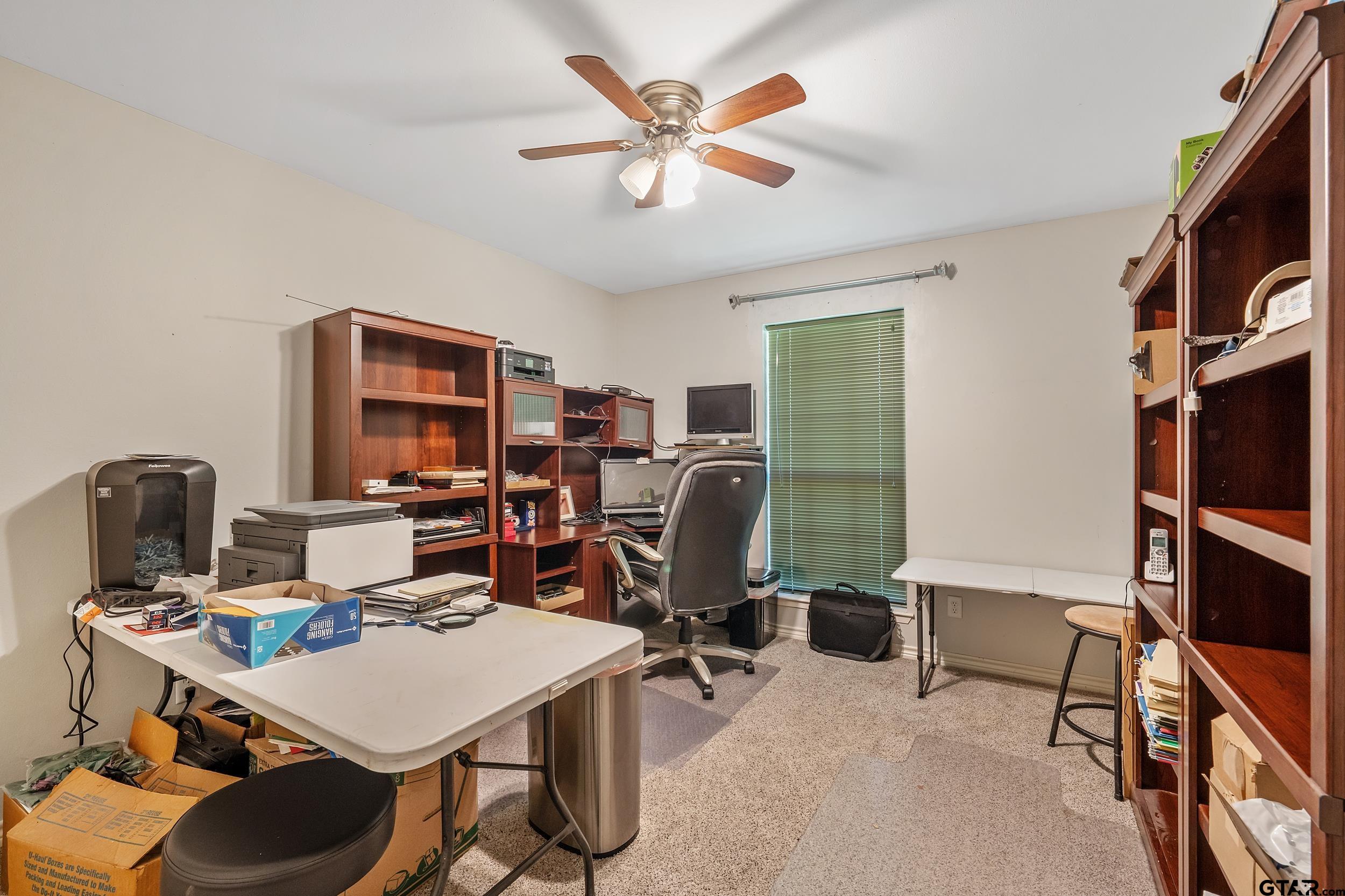 18054 Silver Leaf Flint, TX 75762 - Photo 21 of 30 a view of a workspace with furniture and a window