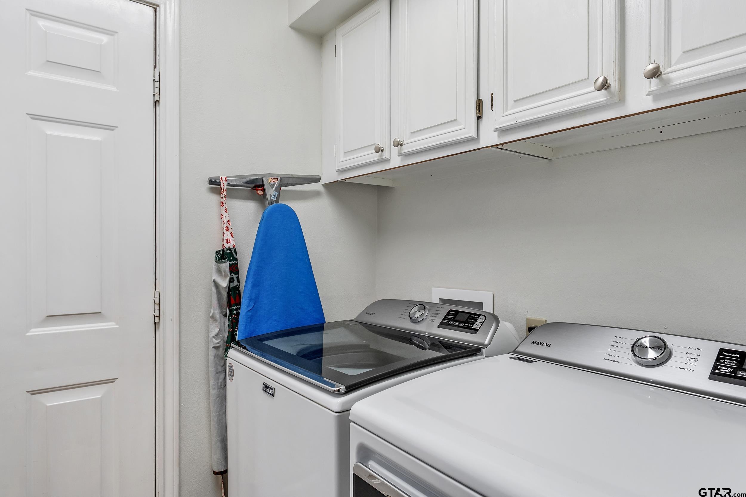 18054 Silver Leaf Flint, TX 75762 - Photo 24 of 30 a utility room with dryer and washer
