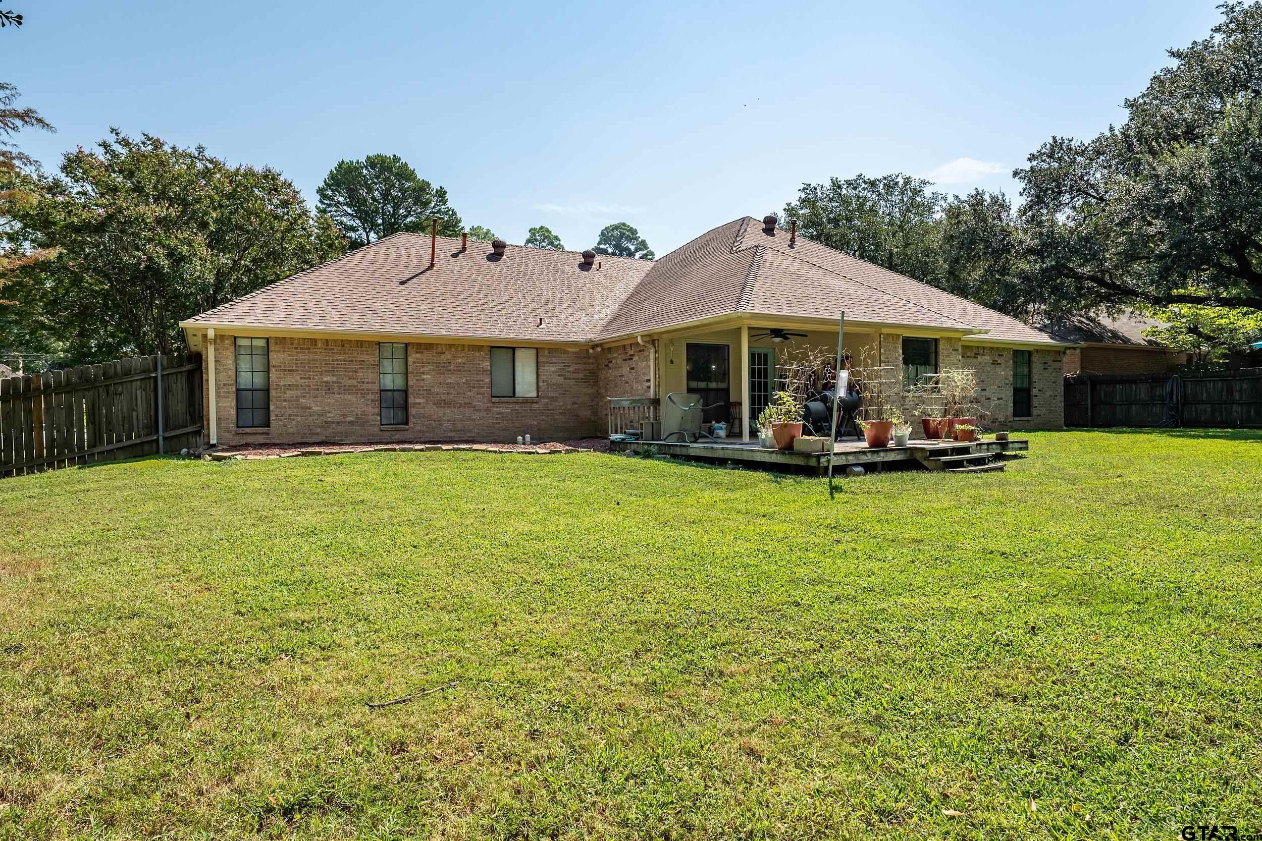 18054 Silver Leaf Flint, TX 75762 - Photo 28 of 30 a view of a house with a yard porch and sitting area