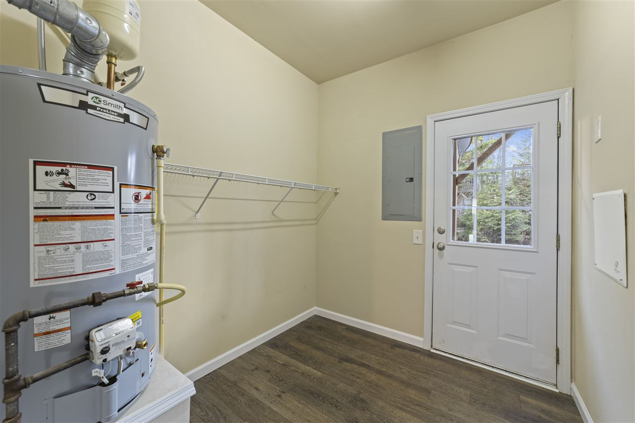 7247 Galon Glen Road Raleigh, NC 27613 - Photo 16 of 21 Hot Water located in utility room -main floor