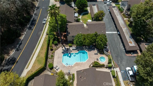 an aerial view of a house with outdoor space