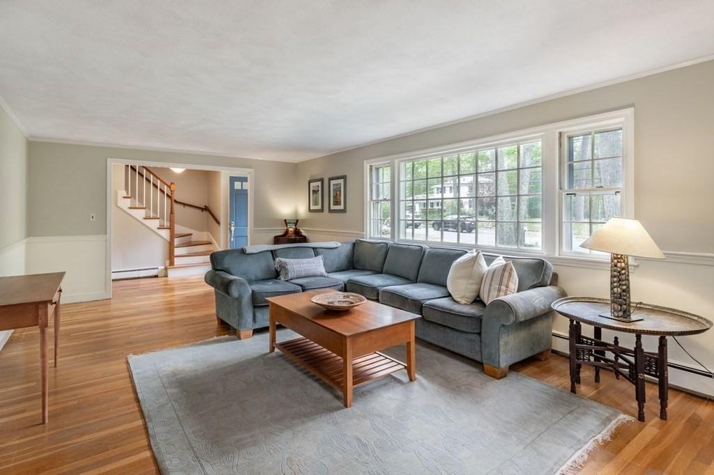 321 Hayward Mill Road Concord, MA 01742 - Photo 5 of 25 a living room with furniture and a window