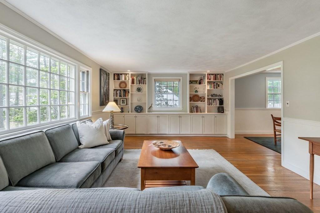 321 Hayward Mill Road Concord, MA 01742 - Photo 6 of 25 a living room with furniture and a large window