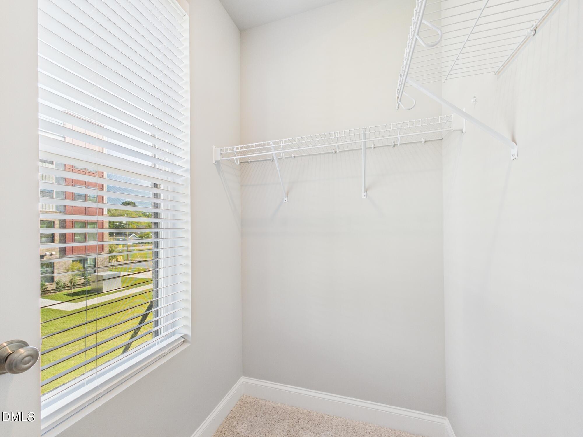 1251 Shaw View Alley, Unit 101 Raleigh, NC 27601 - Photo 23 of 47 a bathroom with a bathtub and shower