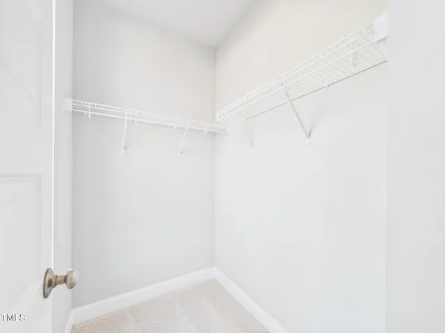 a bathroom with a double vanity sink and mirror