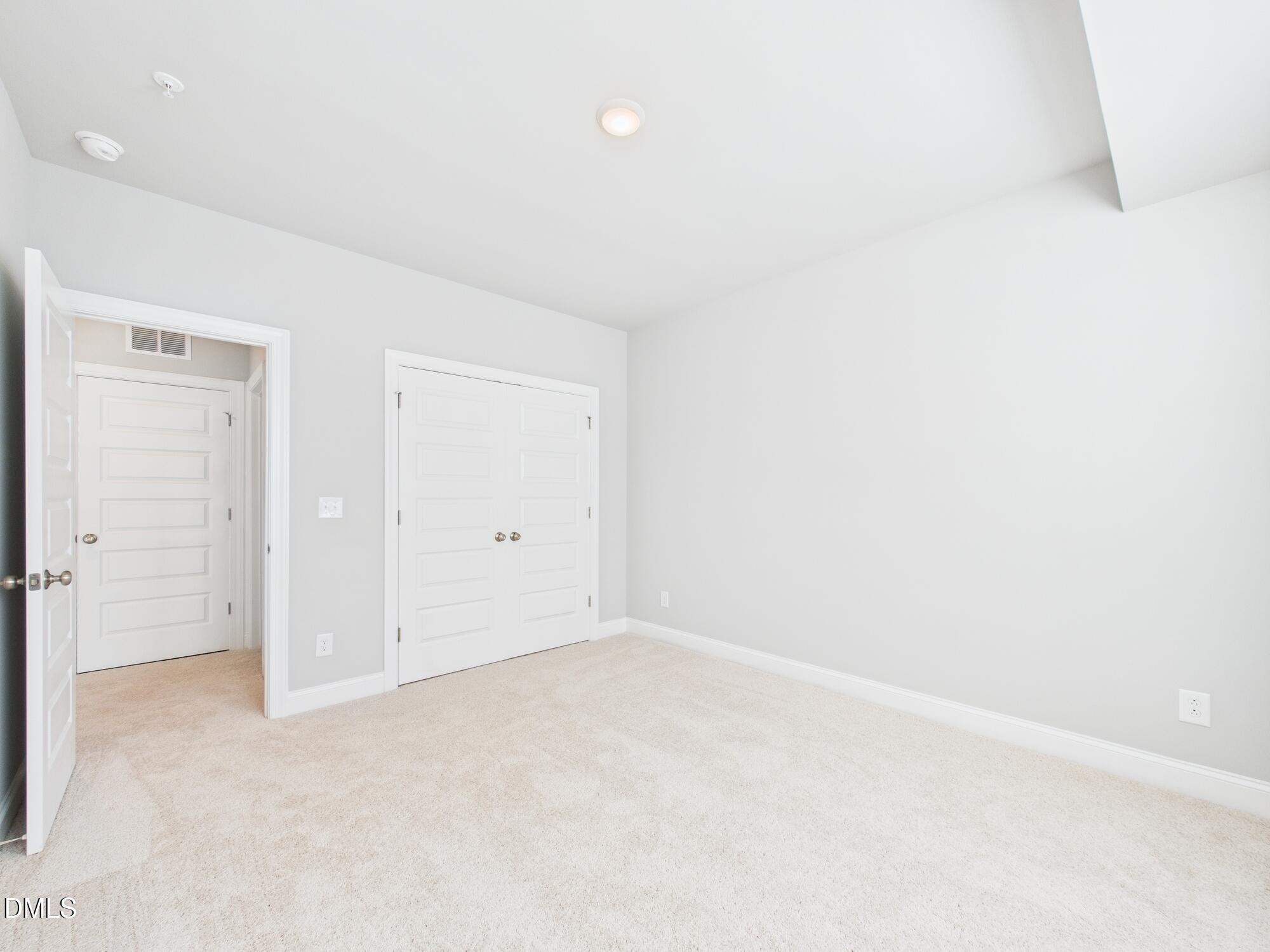1251 Shaw View Alley, Unit 101 Raleigh, NC 27601 - Photo 35 of 47 a view of an empty room