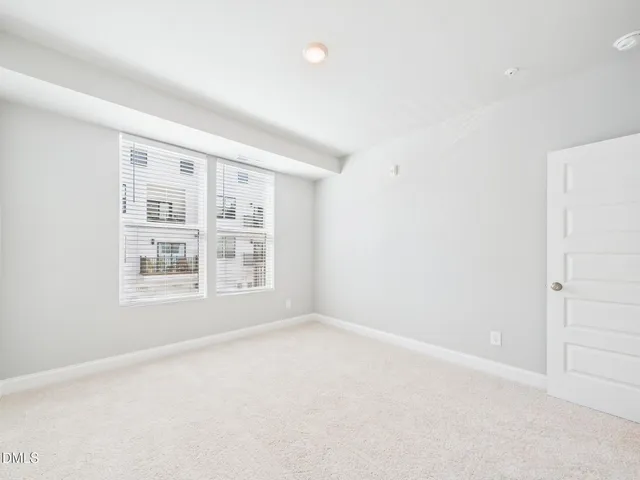 a view of a balcony with a potted plant