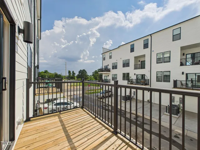 a view of a room with drop ceiling fan
