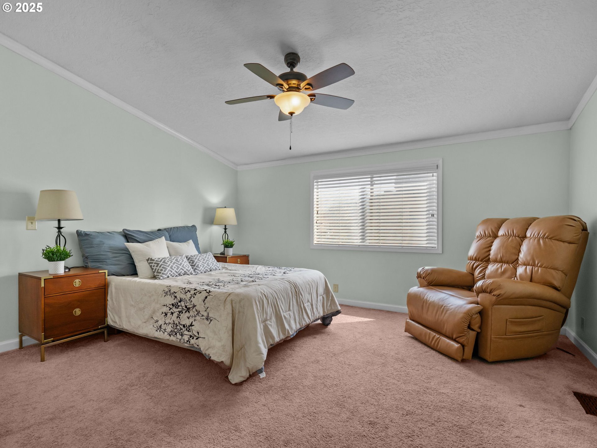 4355 Bren Loop Northeast Salem, OR 97305 - Photo 18 of 44 a bedroom with a bed and a couch