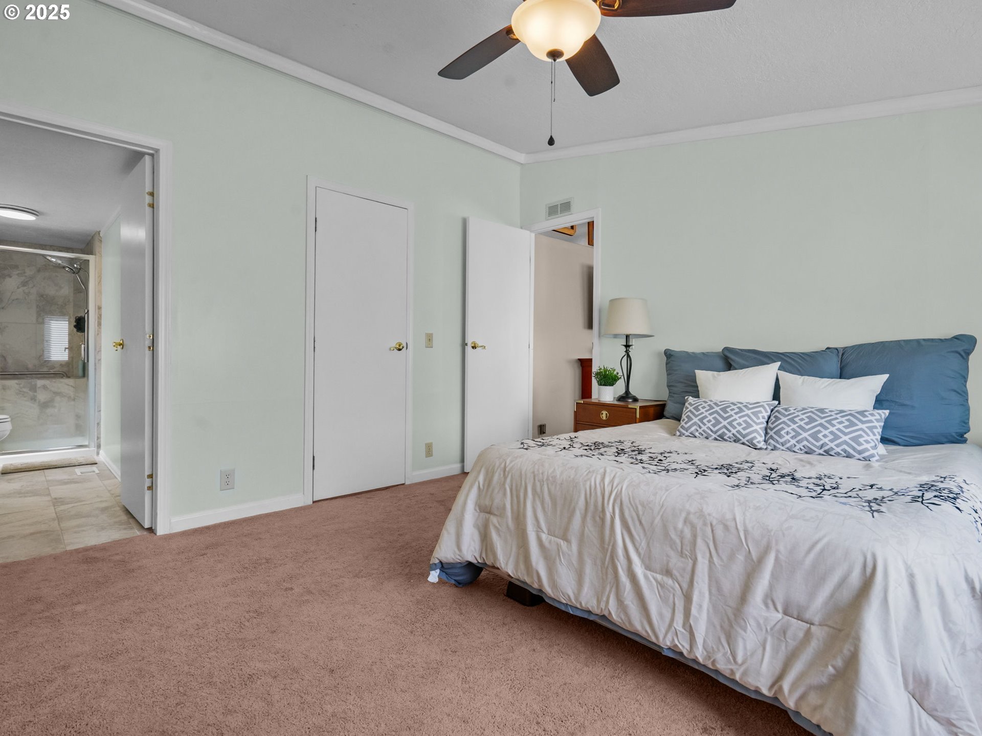 4355 Bren Loop Northeast Salem, OR 97305 - Photo 19 of 44 a bedroom with a bed and a chandelier