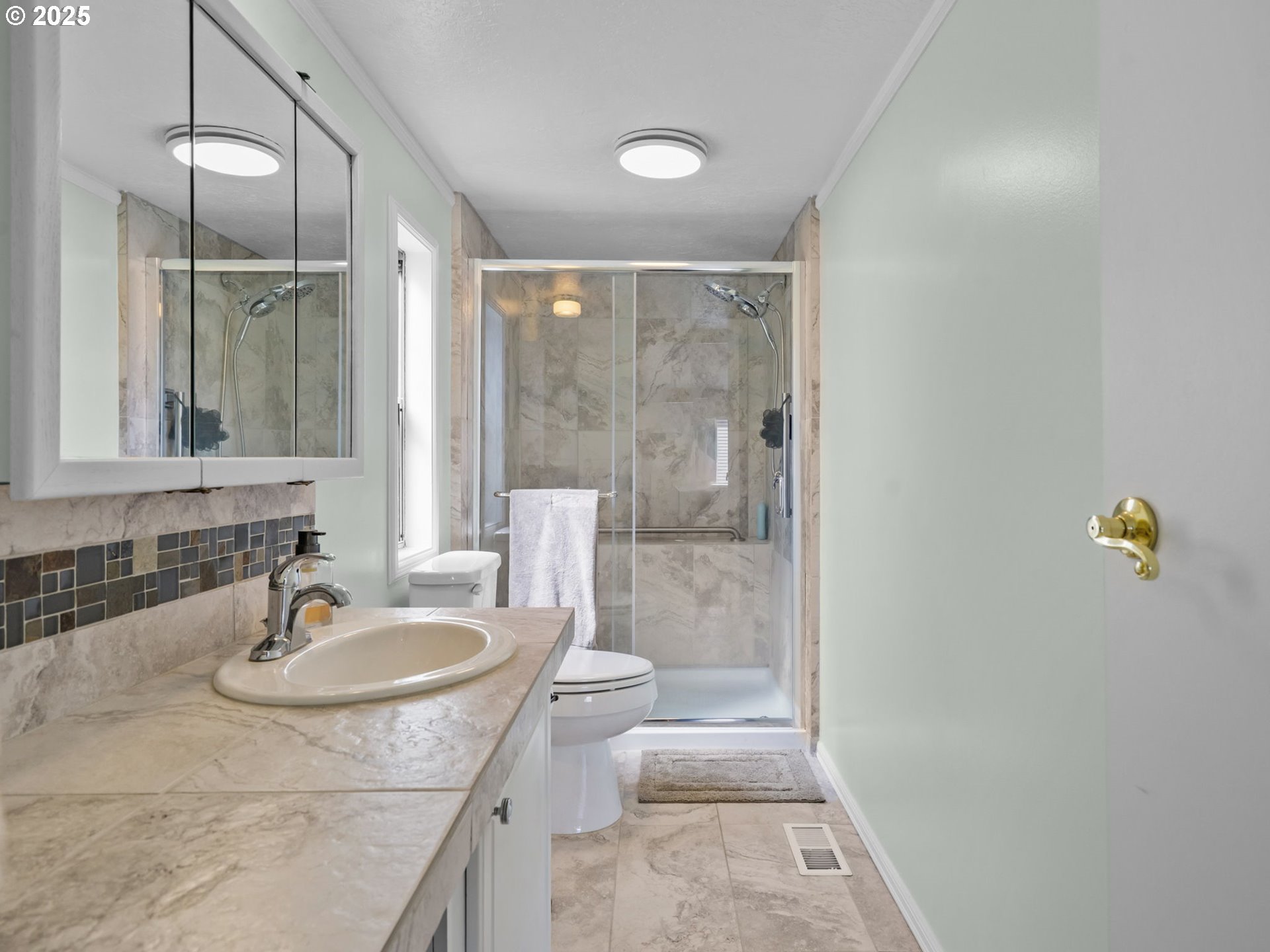 4355 Bren Loop Northeast Salem, OR 97305 - Photo 20 of 44 a bathroom with a sink and a mirror