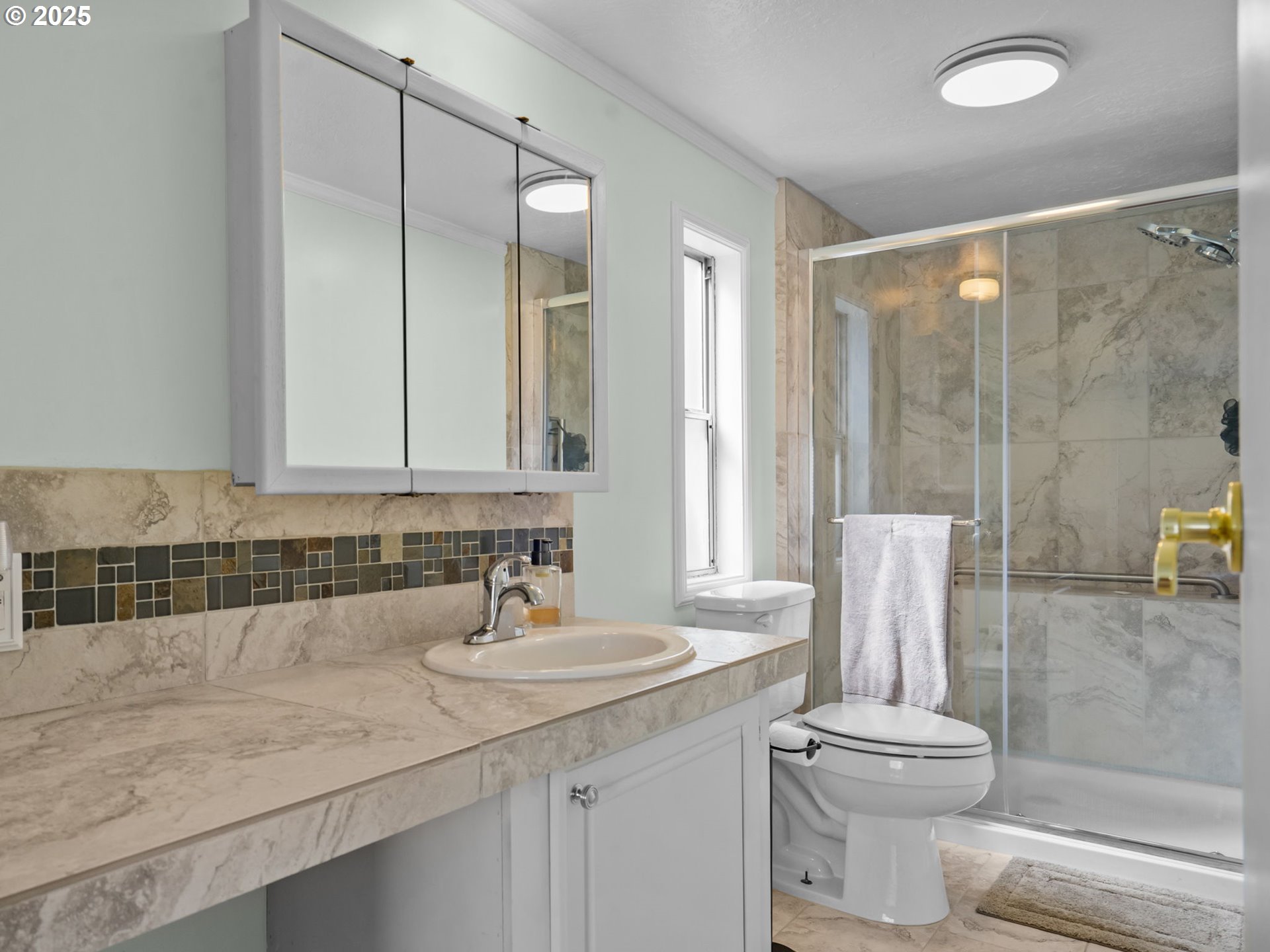 4355 Bren Loop Northeast Salem, OR 97305 - Photo 21 of 44 a bathroom with a sink toilet and shower