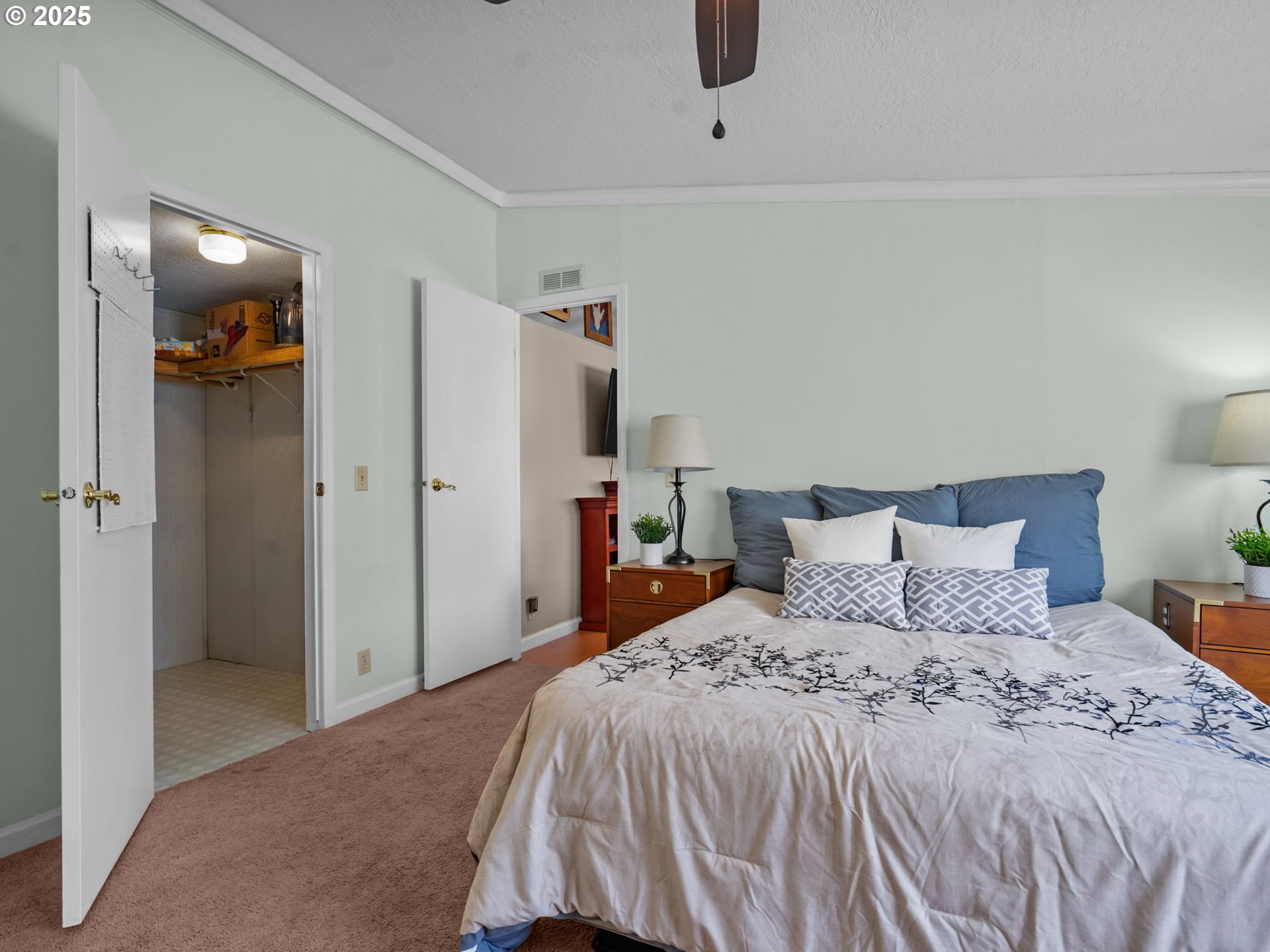 4355 Bren Loop Northeast Salem, OR 97305 - Photo 22 of 44 a bedroom with a bed and cabinets