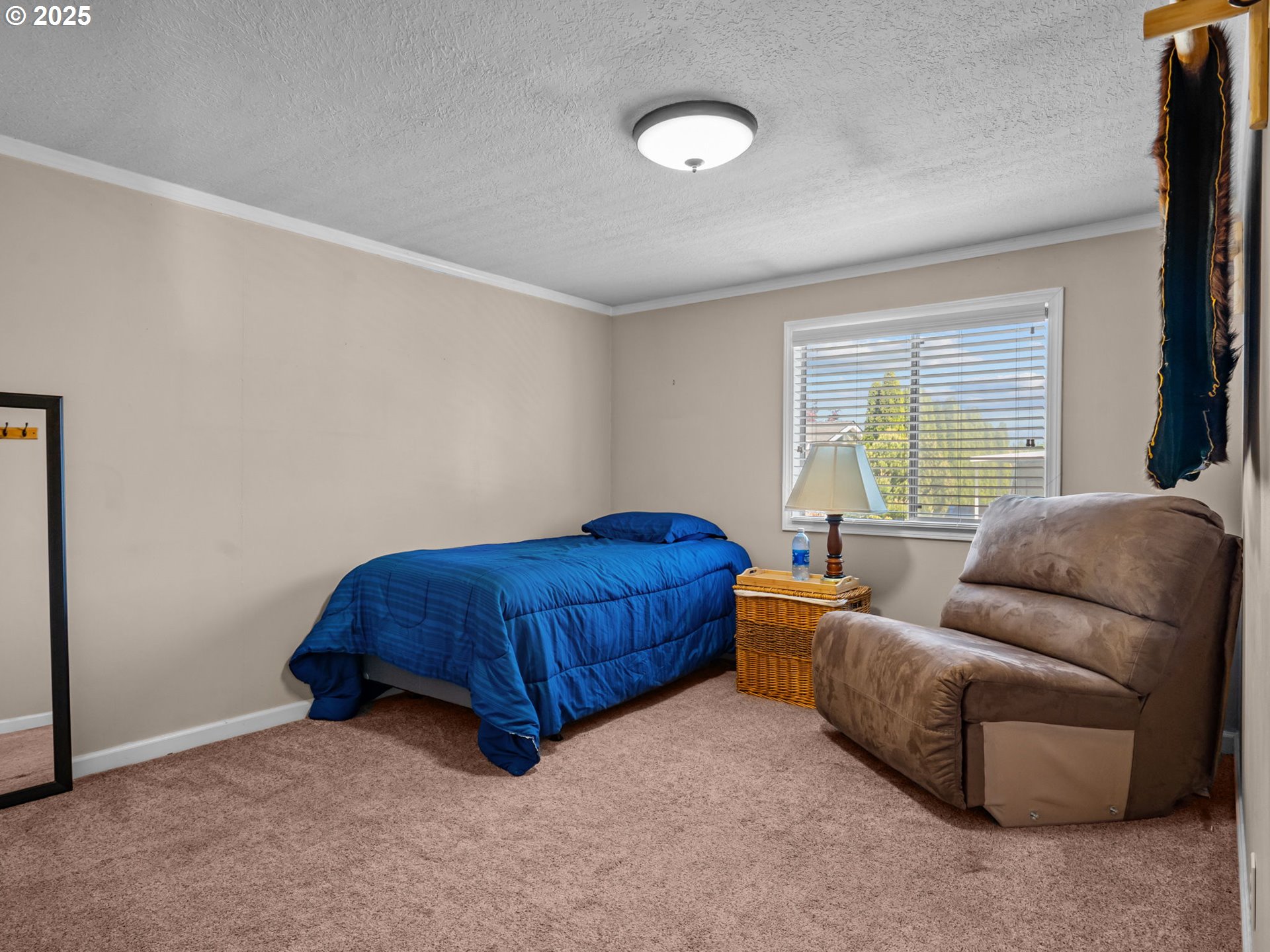 4355 Bren Loop Northeast Salem, OR 97305 - Photo 24 of 44 a living room with furniture and a window