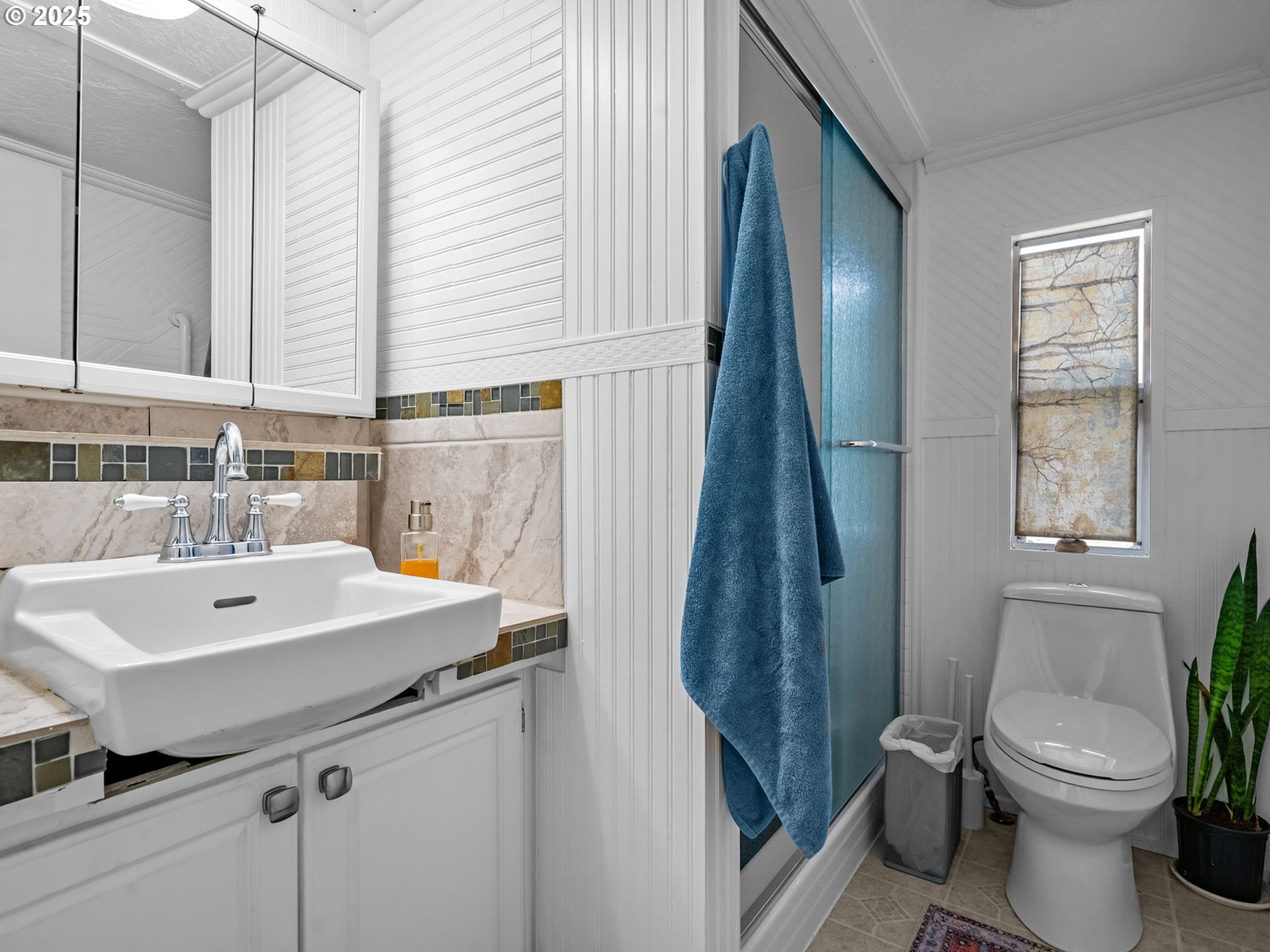 4355 Bren Loop Northeast Salem, OR 97305 - Photo 26 of 44 a bathroom with a sink a toilet and a mirror