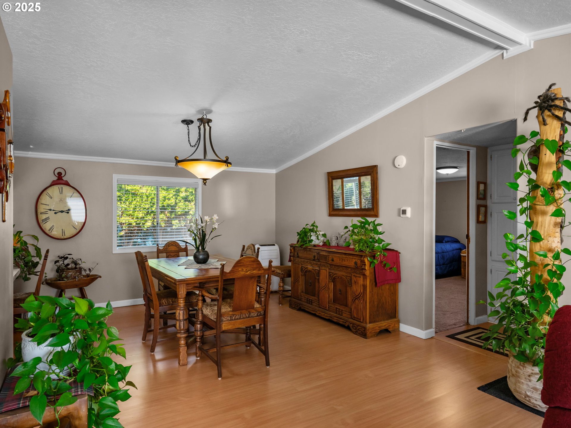 4355 Bren Loop Northeast Salem, OR 97305 - Photo 31 of 44 a view of a dining room with furniture window and wooden floor