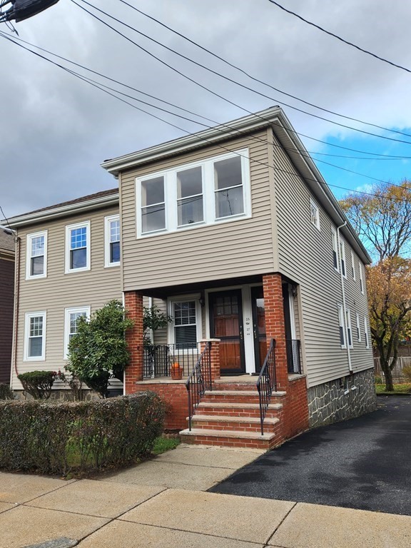 25 Glendower Road, Unit 2 Boston, MA 02131 - Photo 1 of 17 a view of outdoor space yard and front view of a house
