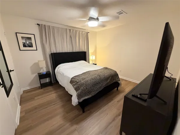 a car parked in front of a house