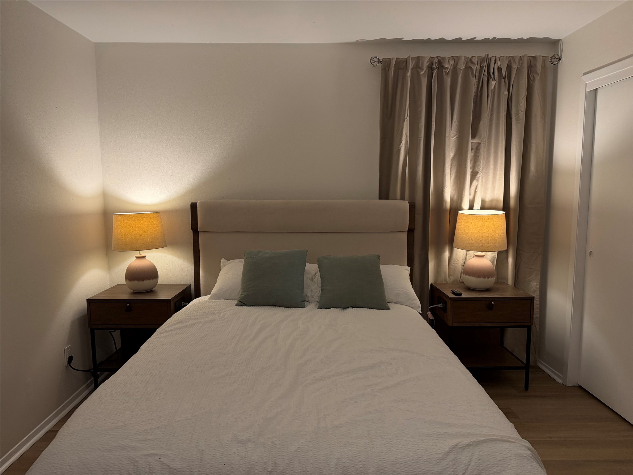 2012 Brun Street, Unit A Houston, TX 77019 - Photo 13 of 16 a bedroom with a bed and a window