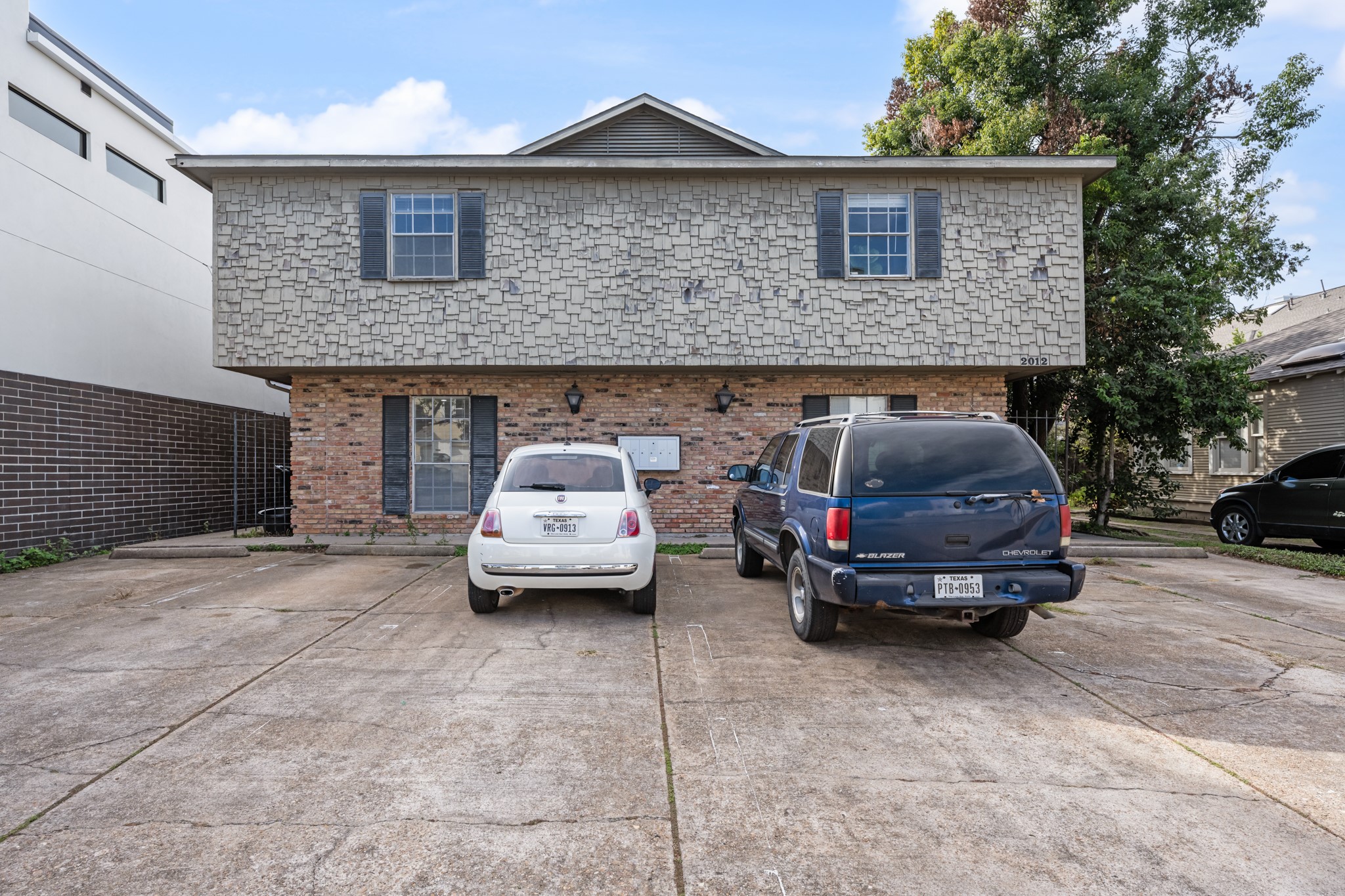2012 Brun Street, Unit A Houston, TX 77019 - Photo 14 of 16 a car parked in front of a house
