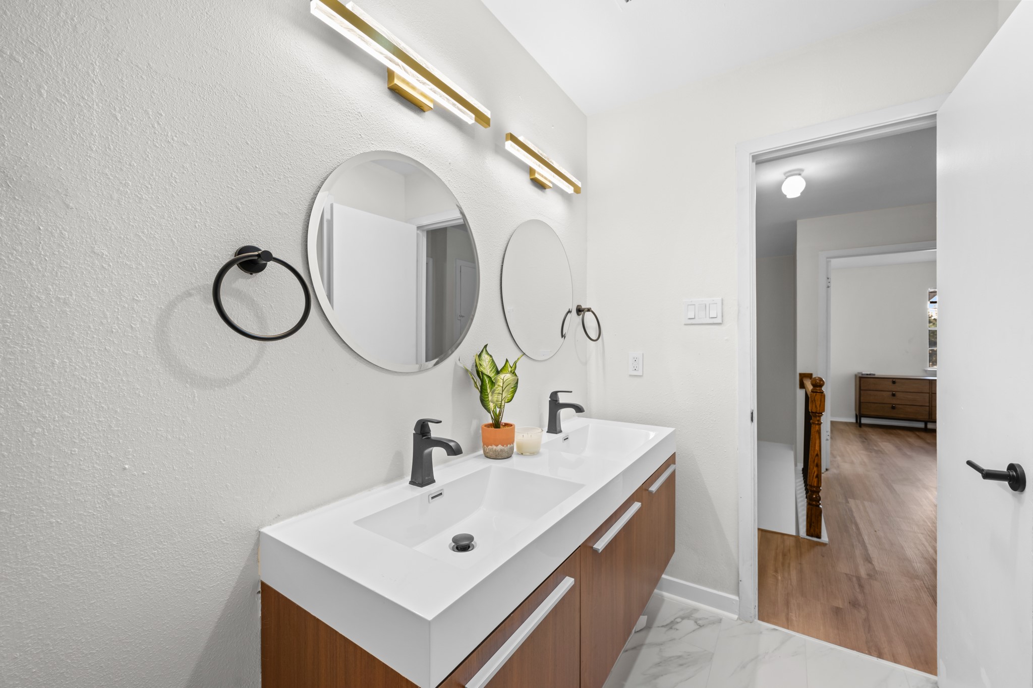 2012 Brun Street, Unit A Houston, TX 77019 - Photo 8 of 16 a bathroom with a sink and a mirror