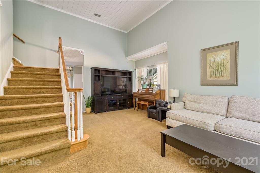 7335 Reedy Creek Road, Unit 25 Charlotte, NC 28215 - Photo 6 of 28 a living room with furniture gym equipment and a view of living room