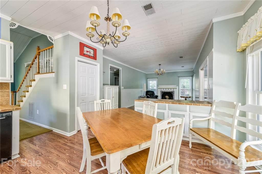 7335 Reedy Creek Road, Unit 25 Charlotte, NC 28215 - Photo 9 of 28 a view of a dining room with furniture