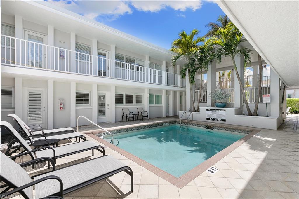 175 5th Avenue South, Unit 103 Naples, FL 34102 - Photo 17 of 18 a view of a house with backyard and sitting area