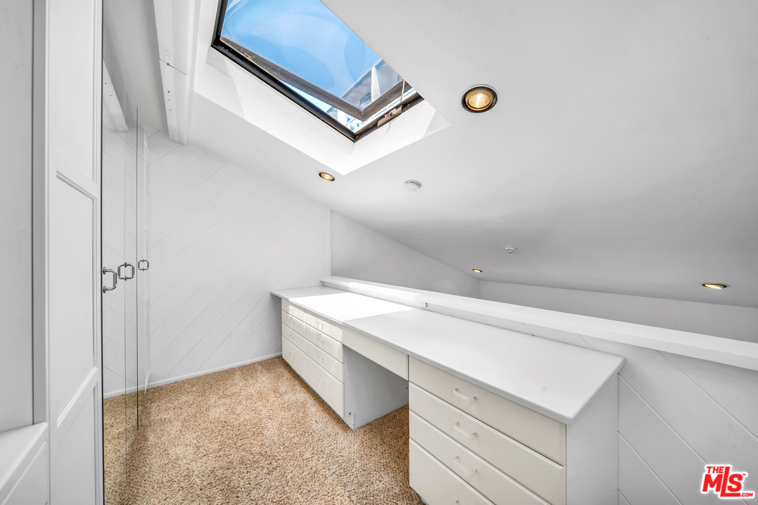 615 Esplanade, Unit 401 Redondo Beach, CA 90277 - Photo 14 of 19 a view of storage and utility room with washer and dryer