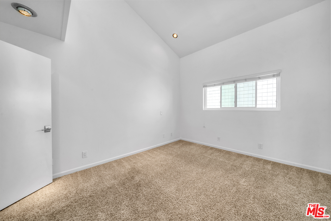 615 Esplanade, Unit 401 Redondo Beach, CA 90277 - Photo 17 of 19 an empty room with windows