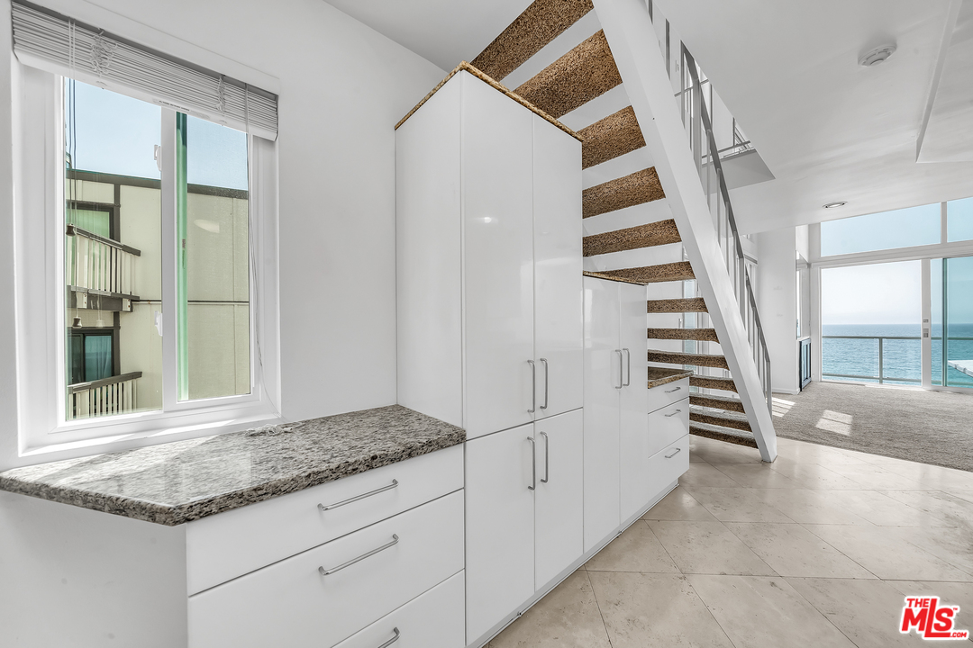 615 Esplanade, Unit 401 Redondo Beach, CA 90277 - Photo 10 of 19 a view of entryway and hall with a window