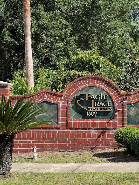 1569 Northwest 29 Road, Unit 3 Gainesville, FL 32605 - Photo 14 of 14 a sign on the side of a road