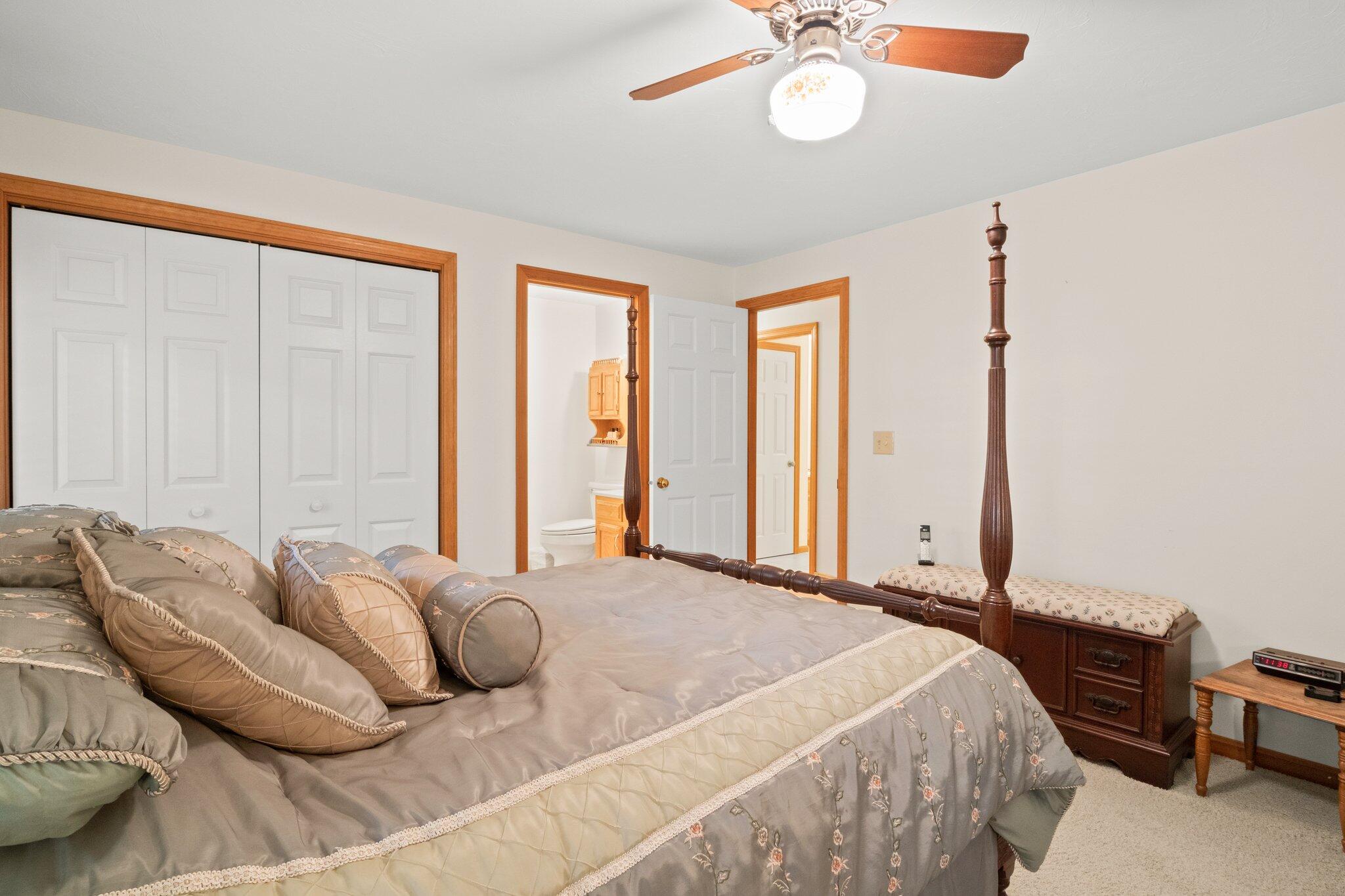 196 Eisenhower Drive Cotuit, MA 02635 - Photo 20 of 33 a bedroom with bed and a window