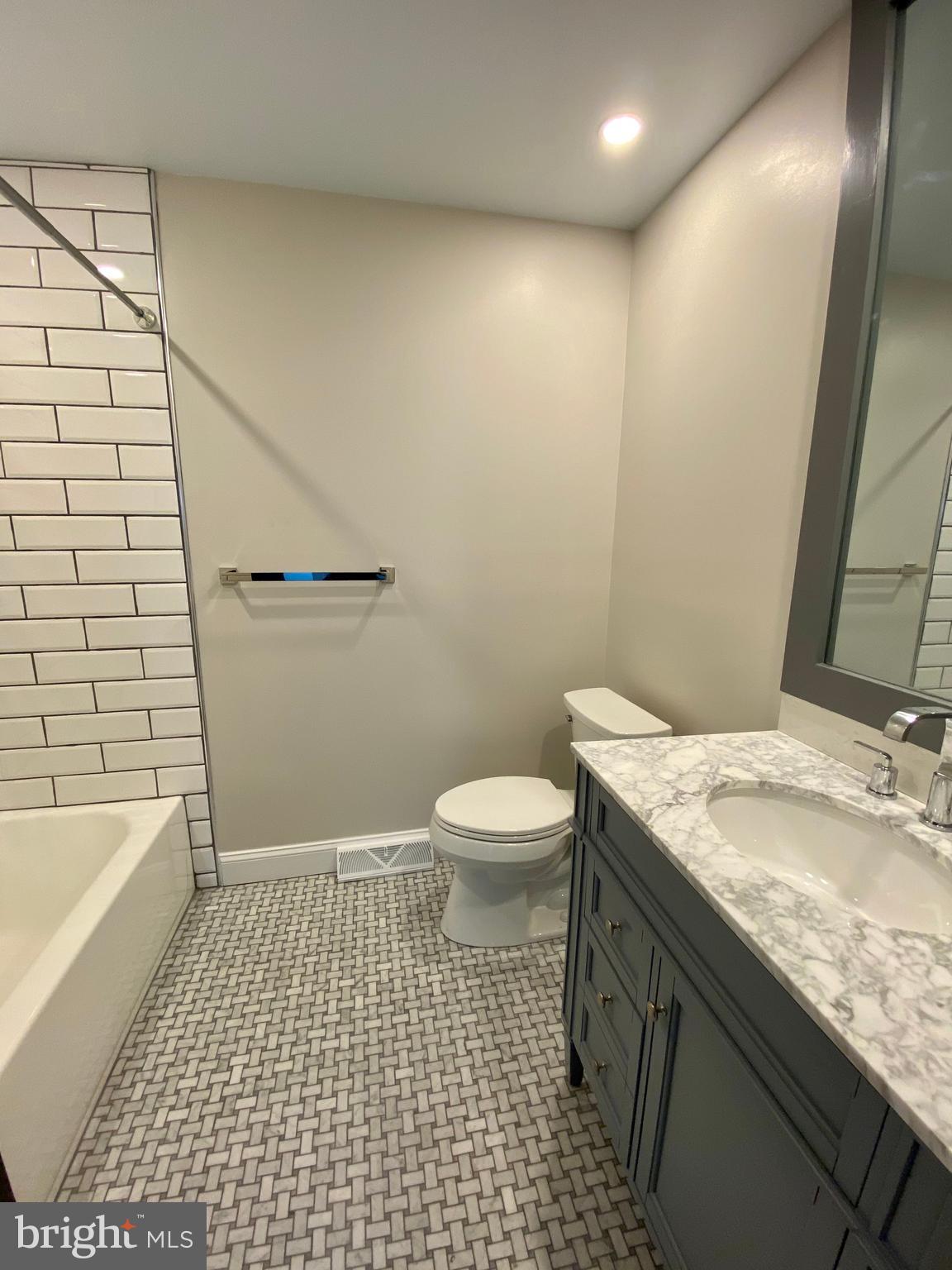 2417 Shellpot Drive Wilmington, DE 19803 - Photo 11 of 18 a bathroom with a granite countertop sink toilet and shower