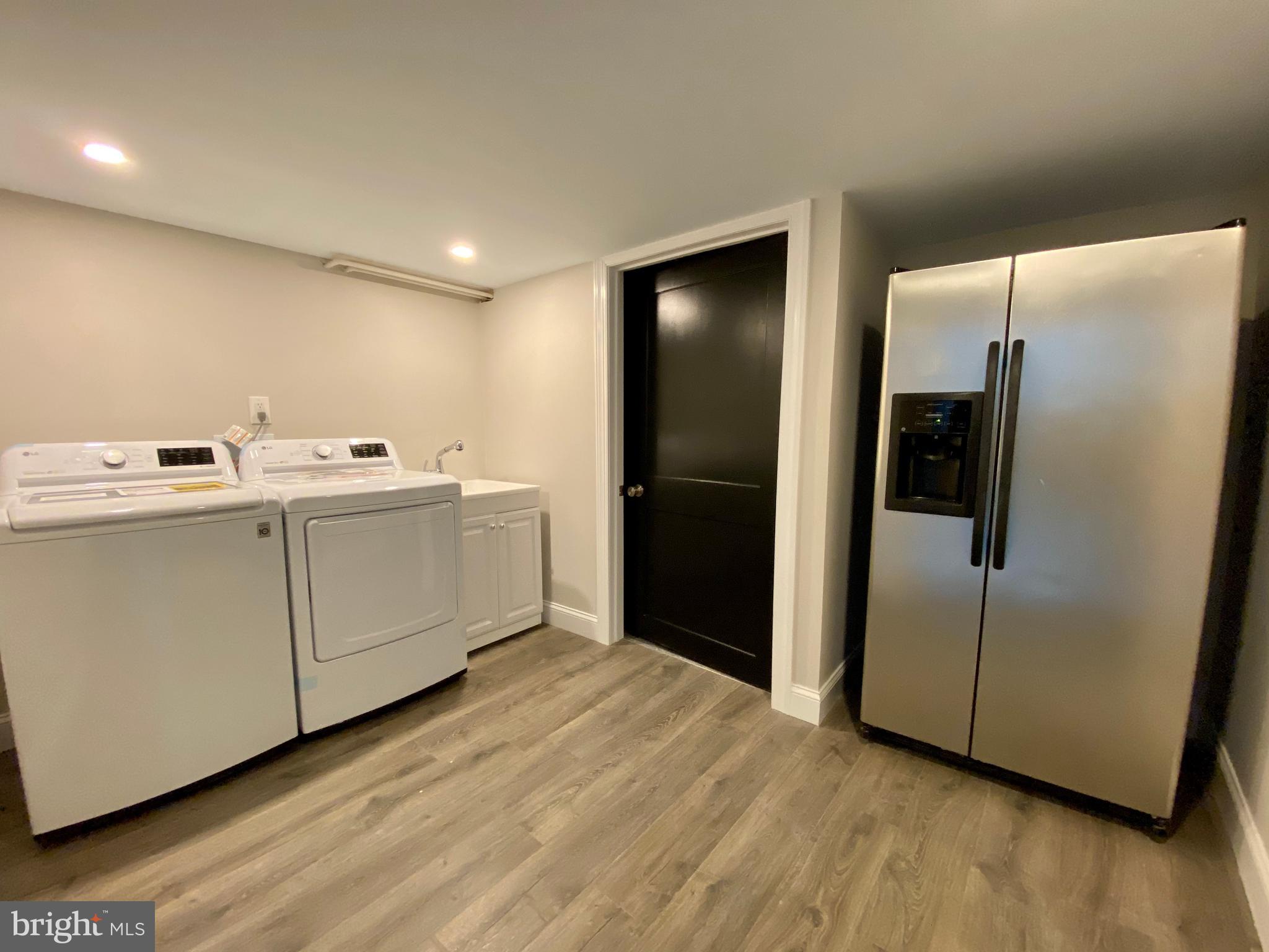 2417 Shellpot Drive Wilmington, DE 19803 - Photo 17 of 18 a view of a kitchen with a sink and refrigerator