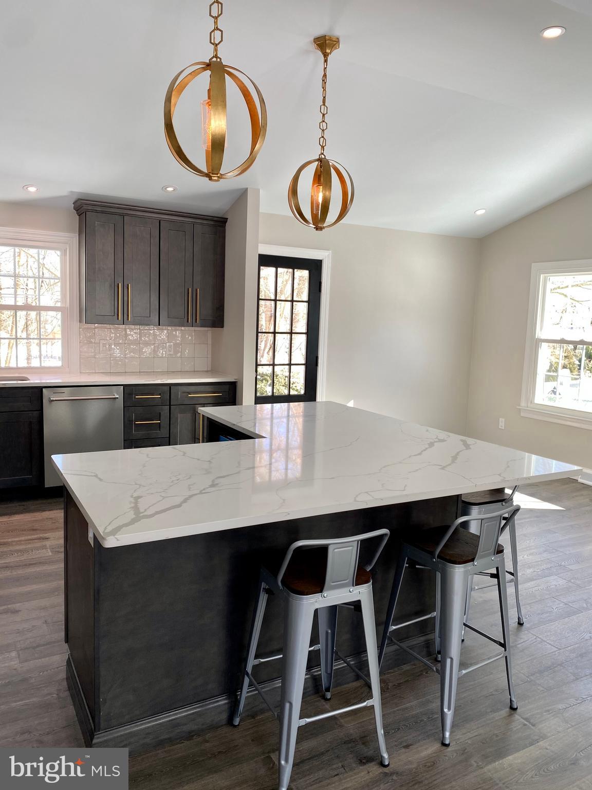 2417 Shellpot Drive Wilmington, DE 19803 - Photo 9 of 18 a kitchen with a table and chairs in it