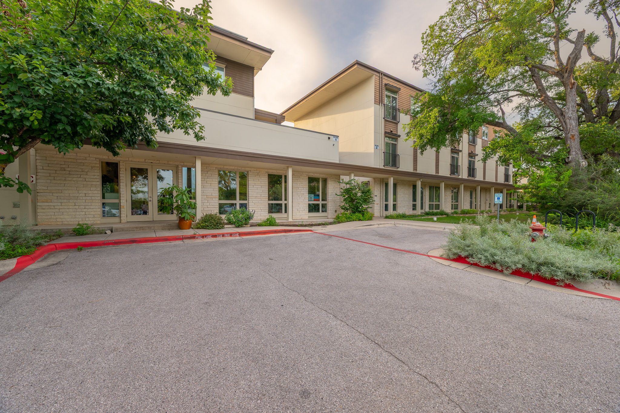 6700 Menchaca Road, Unit 24 Austin, TX 78745 - Photo 18 of 18 View of property featuring uncovered parking