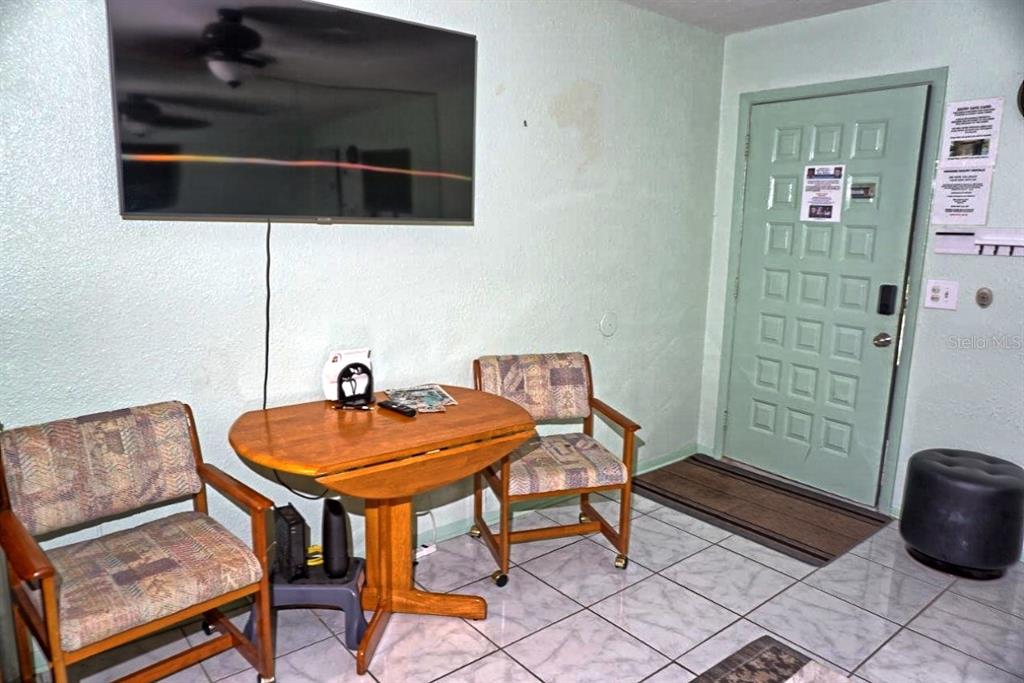 20921 Haulover Cove Road, Unit F5 Lutz, FL 33558 - Photo 7 of 34 a living room with furniture