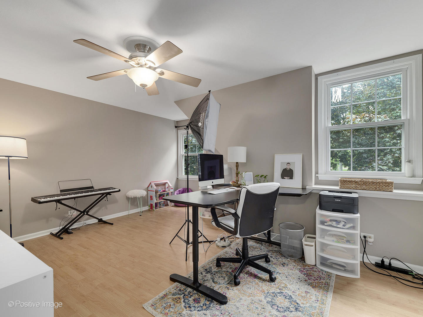 800 West Roosevelt Road Wheaton, IL 60187 - Photo 19 of 28 a workspace with furniture window and a ceiling fan