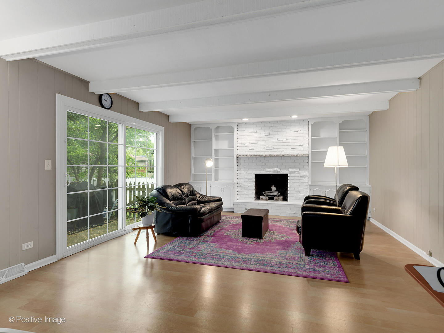 800 West Roosevelt Road Wheaton, IL 60187 - Photo 6 of 28 a living room with furniture and a fireplace
