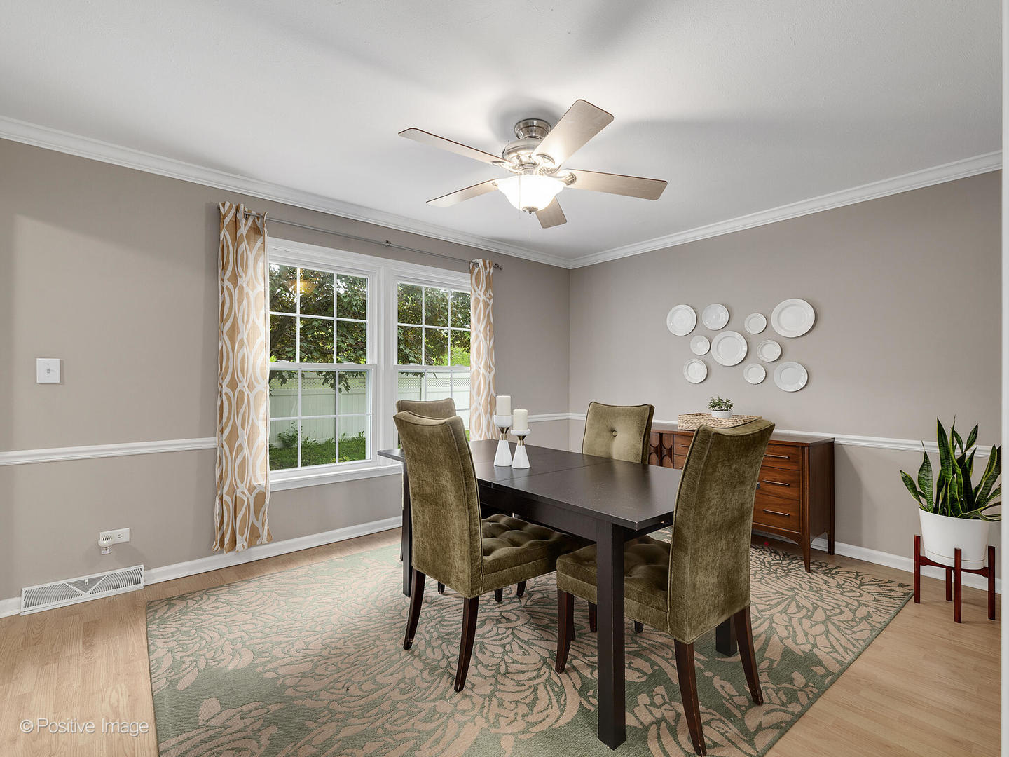 800 West Roosevelt Road Wheaton, IL 60187 - Photo 7 of 28 a view of a dining room with furniture window and wooden floor