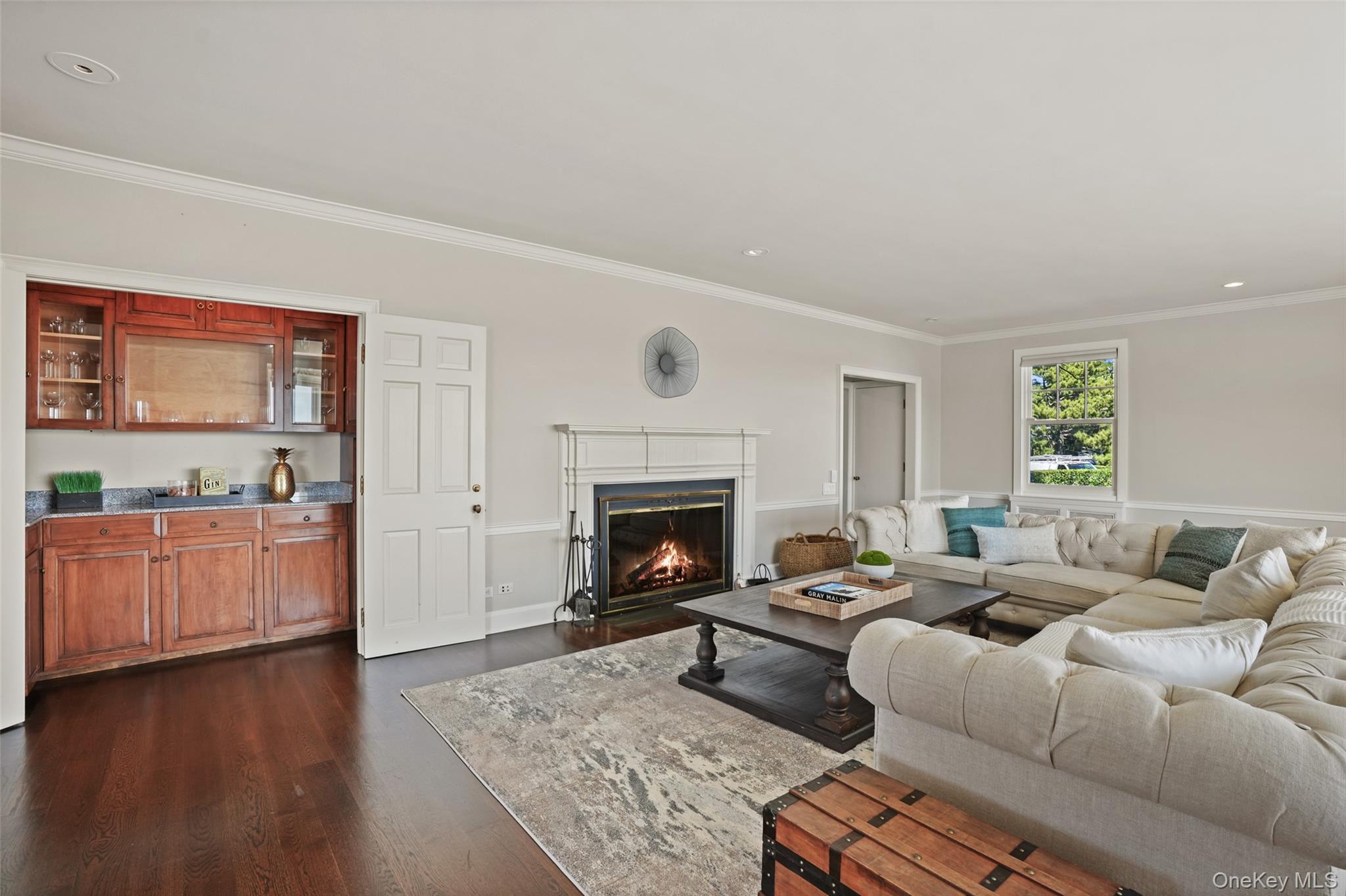 6 Pine Island Road Rye, NY 10580 - Photo 12 of 38 a living room with furniture and a fireplace