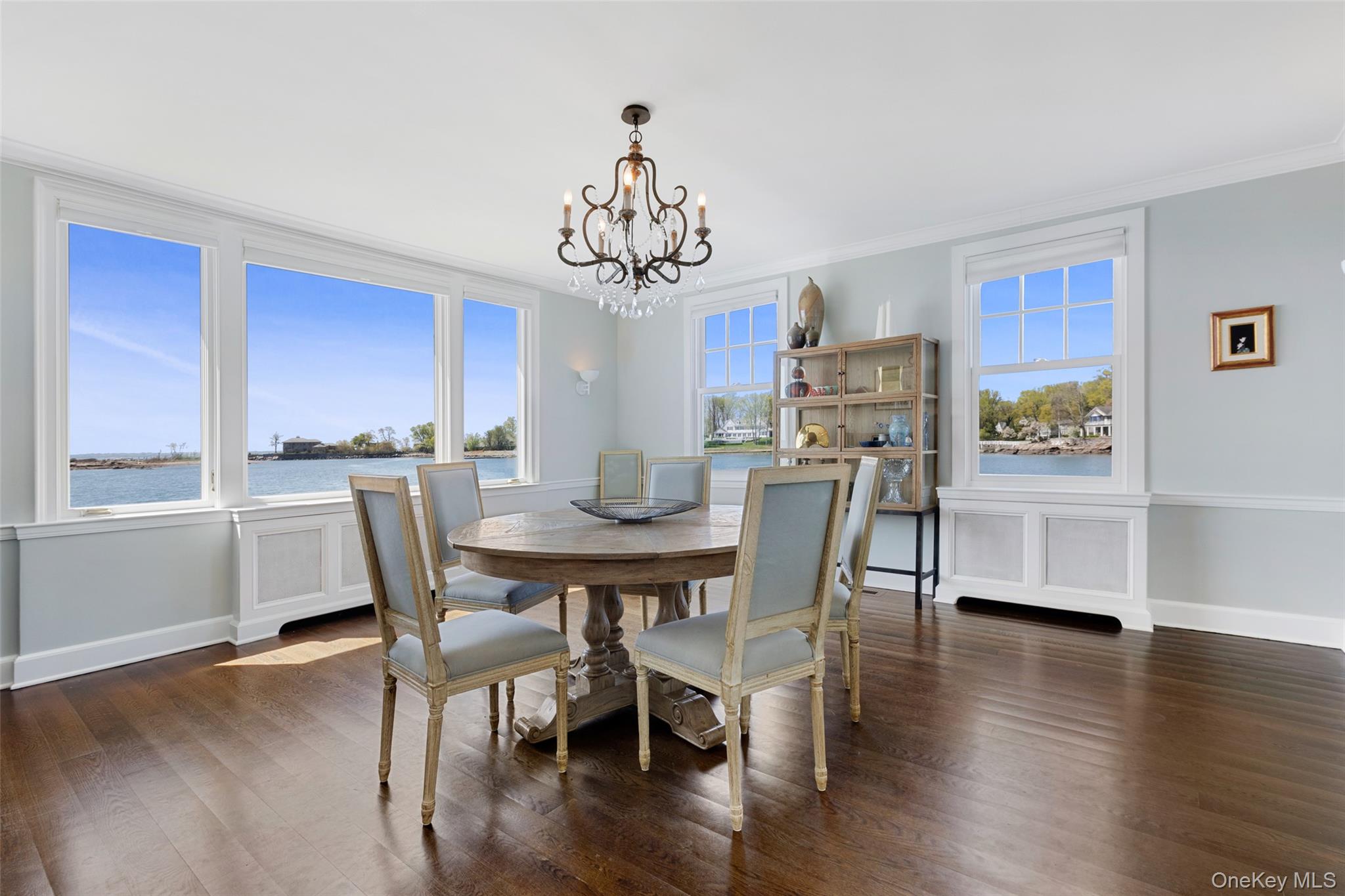 6 Pine Island Road Rye, NY 10580 - Photo 13 of 38 a view of a dining room with furniture window and wooden floor