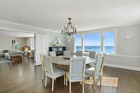 a bedroom with a bed chair and a window