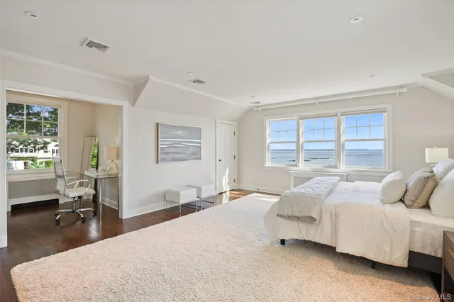 a large white room with a large window