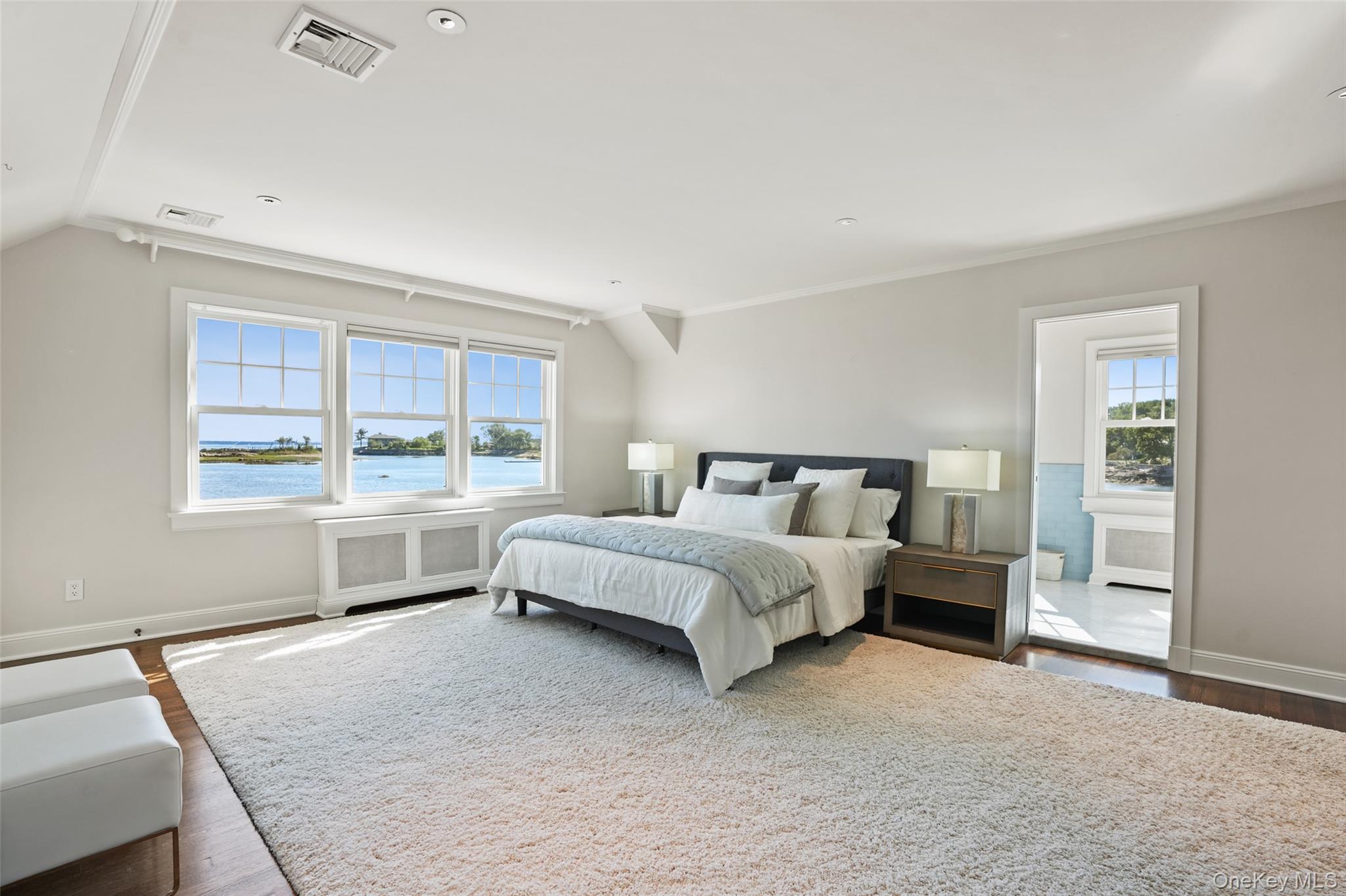 6 Pine Island Road Rye, NY 10580 - Photo 18 of 38 a bed room with a bed and a table