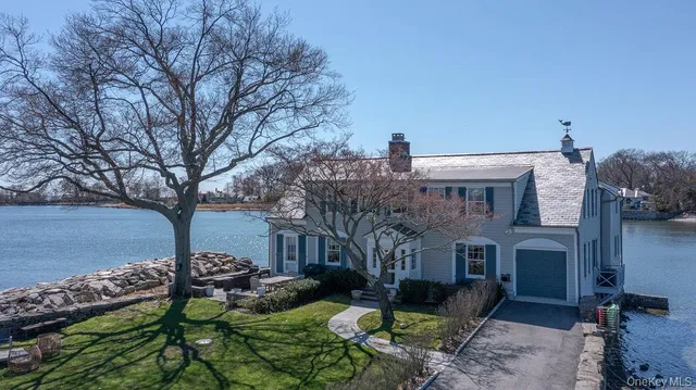 a view of a chairs and table in the patio