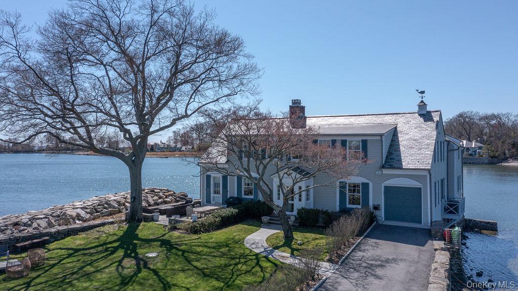 6 Pine Island Road Rye, NY 10580 - Photo 2 of 38 a view of a chairs and table in the patio